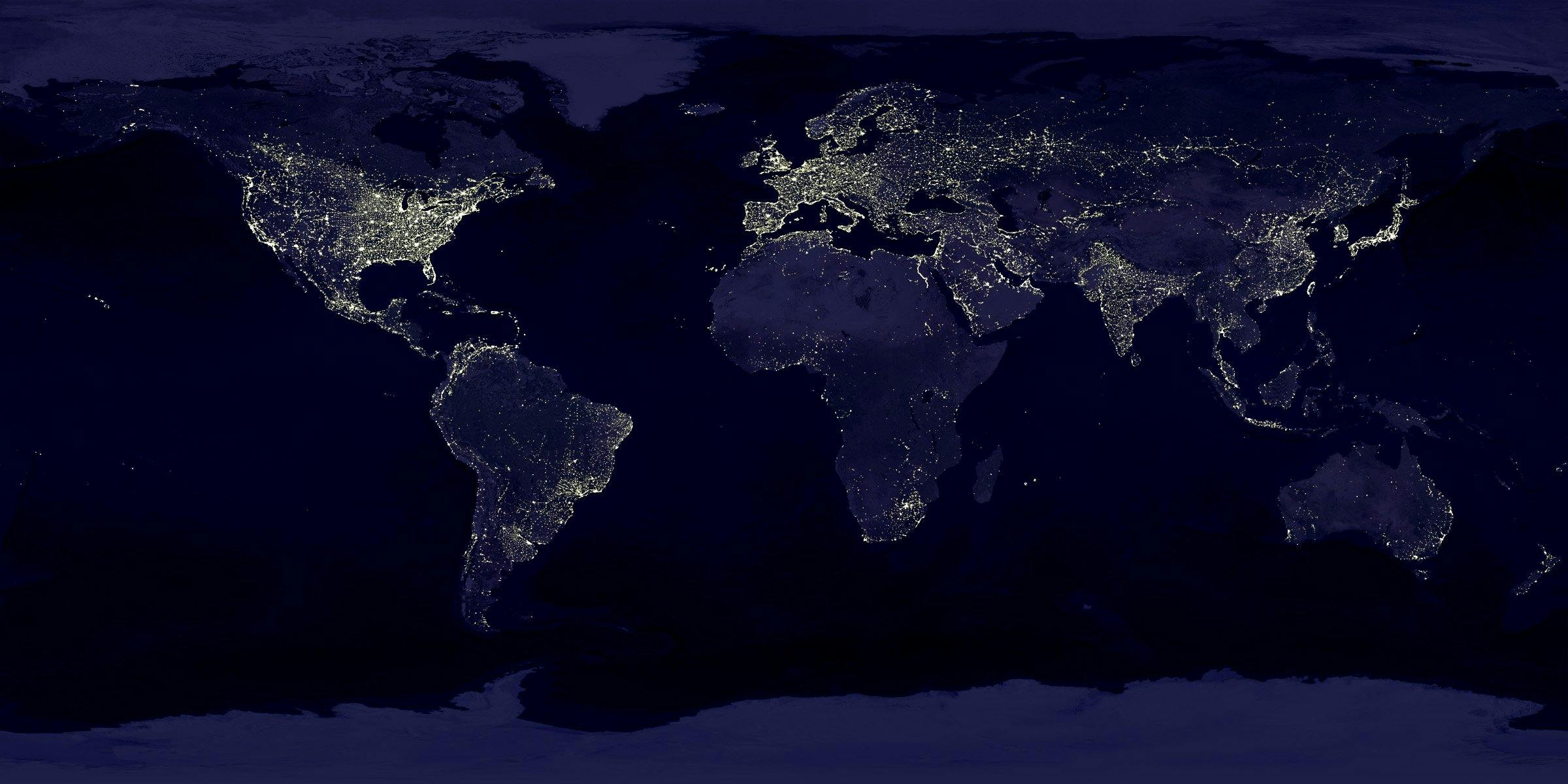 earth-earth-at-night-night-lights-41949-41949 Satellite view of Earth at night with illuminated cities across continents.